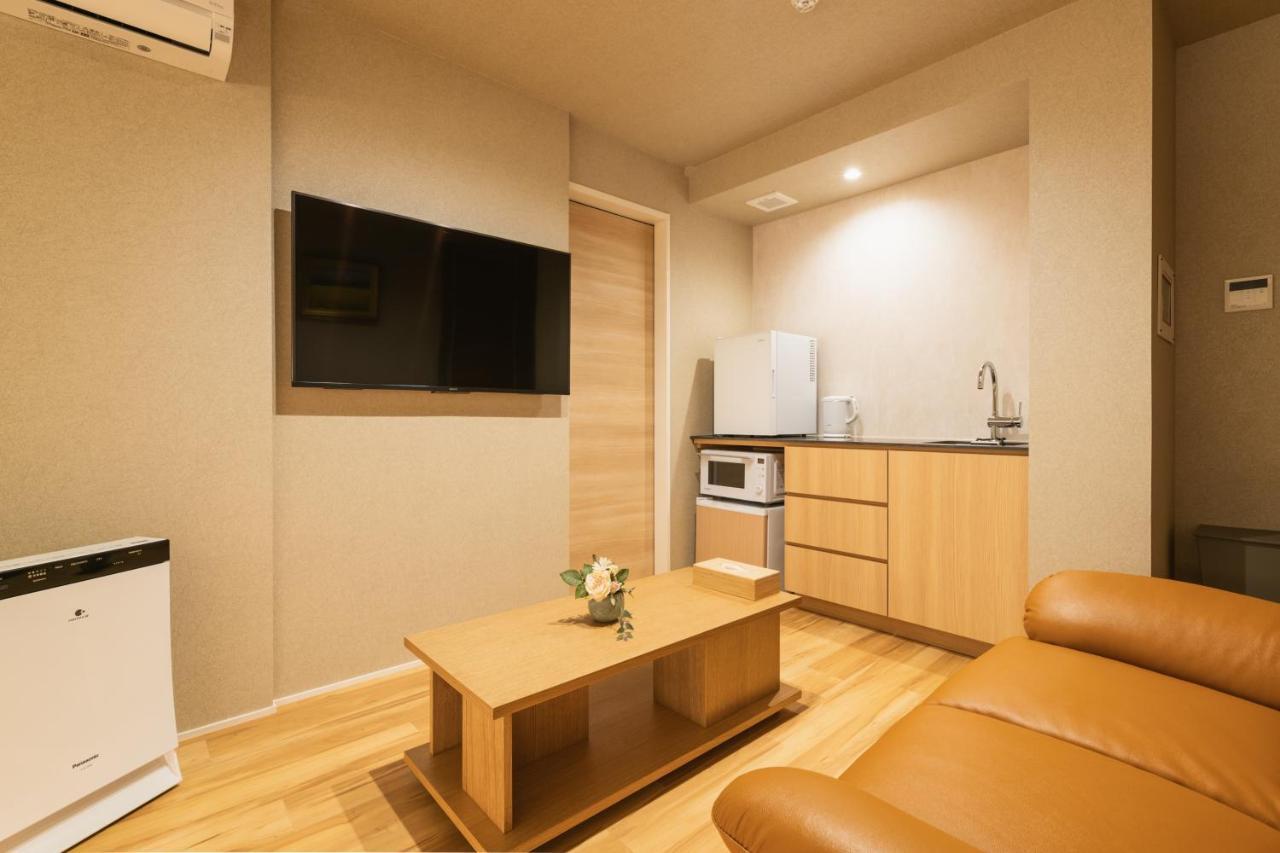 Grand Base Hakatamon Aparthotel Fukuoka  Exteriör bild