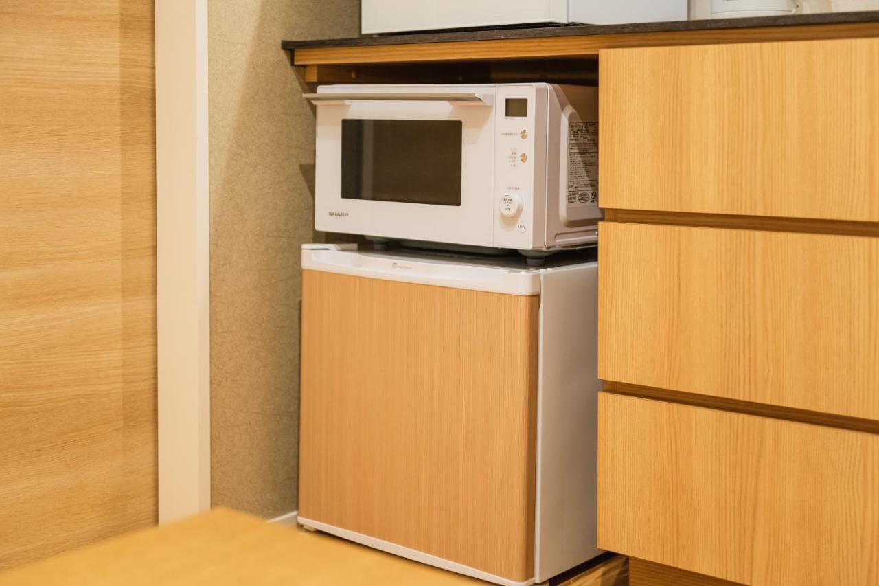 Grand Base Hakatamon Aparthotel Fukuoka  Exteriör bild