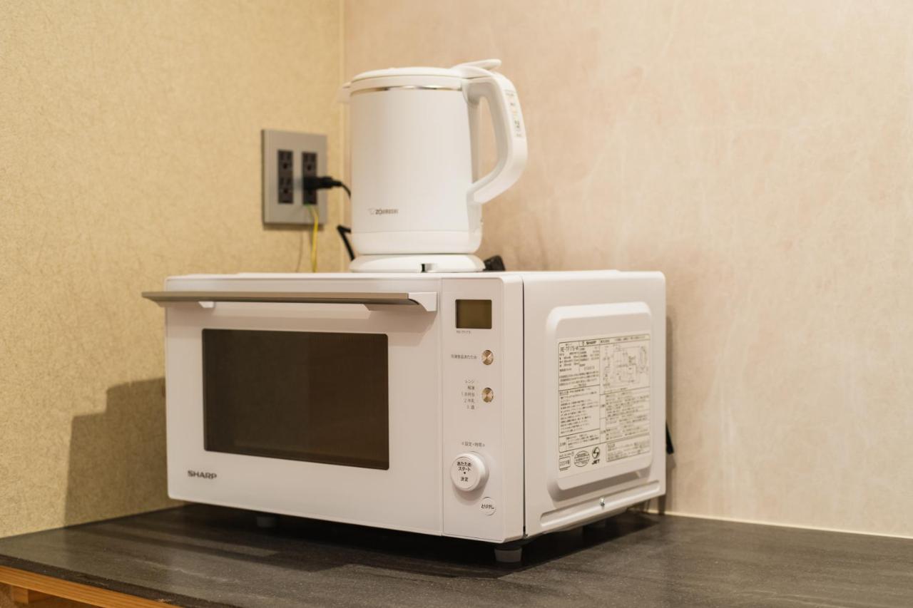 Grand Base Hakatamon Aparthotel Fukuoka  Exteriör bild
